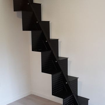 Ladder staircase that had to fit through a 9 inch window