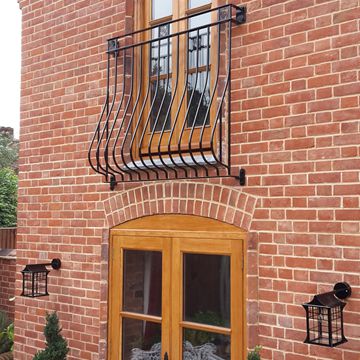 Pair of wall lights and a Juliet balcony